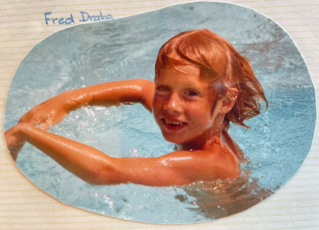 Fred Drake swimming as a child